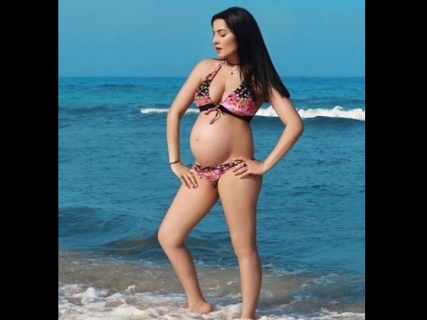 Celina Jaitly flaunts her baby bump in a bikini
