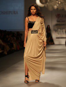 New Delhi: A Model walk the ramp for Vogue Sari 24/7 Show at Amazon India Fashion Week Autumn Winter 2017 in New Delhi, on March 15,2017. (Photo: Amlan Paliwal /IANS)
