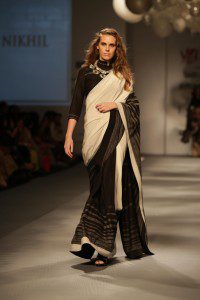 New Delhi: A Model walk the ramp for Vogue Sari 24/7 Show at Amazon India Fashion Week Autumn Winter 2017 in New Delhi, on March 15,2017. (Photo: Amlan Paliwal /IANS)